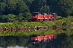 NR-2 pulls through the curve at the top of Mill Cove in Ledyard, CT, showing a nice reflection NR-2 pulls through the curve at the top of Mill Cove in Ledyard, CT, showing a nice reflection