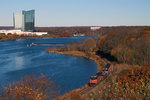 NR-2 skirts along the Thames River amongst the remaining fall colors in Preston, CT with the Mohegan Sun casino in the background