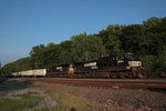 NS train 261 comes into full sunshine as they begin to head west NS train 261 comes into full sunshine as they begin to head west