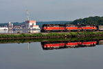 NR-2 continues south along Mill Cove with the AES Thames power plant in the background and a coal barge NR-2 continues south along Mill Cove with the AES Thames power plant in the background and a coal barge