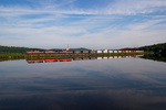 NR-2 stretches out along the causeway between a calm Mill Cove and the Thames River NR-2 stretches out along the causeway between a calm Mill Cove and the Thames River