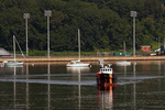 A US Coast Guard training vessel slips away from the US Coast Guard Academy in New London, CT A US Coast Guard training vessel slips away from the US Coast Guard Academy in New London, CT