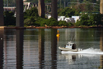 A US Navy police boat heads south in the Thames River A US Navy police boat heads south in the Thames River
