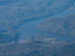 The Bear Mountain bridge over the Hudson River, with Iona Island to the bottom right