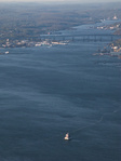The view north up the Thames River, with the Ledge Light in the foreground