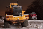 A payloader sits near the tied down NECR train in South Windham