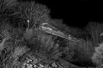 Providnece & Worcester train NR-4X crosses the Packer's Pond waterfall in Plainfield, CT