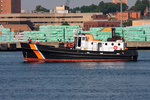 A US Coast Guard training vessel heads south in the Thames A US Coast Guard training vessel heads south in the Thames