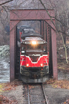 Empty Providence & Worcester coal extra heads south over the Yantic River in Norwich, CT Empty Providence & Worcester coal extra heads south over the Yantic River in Norwich, CT