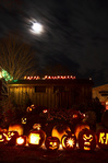 Glowing pumpkins under a glowing moon