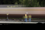 A switchman lines a switch as AYMO heads out of the yard