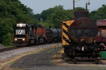 Norfolk Southern train 68Q rolls past some of the Phillipsburg Railroad Historian's equipment in Phillipsburg, NJ