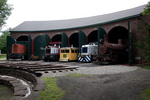 All pits occupied!  Left to right:  GE 44 tonner, Fairmont Speeder, GE 45 tonner, MEC Fairmont Railbus, GE 25 tonner, Baldwin 0-4-0T