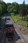 NR-2s conductor lines the switch for the locomotive to head back to the train