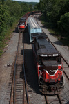 The lead locomotive heads out to tie onto the remainder of the train
