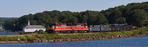 NR-2 skirts along Mill Cove and the Thames River, with the Harvard boat house in the background NR-2 skirts along Mill Cove and the Thames River, with the Harvard boat house in the background