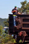 A closeup of Don riding the shove through the yard A closeup of Don riding the shove through the yard